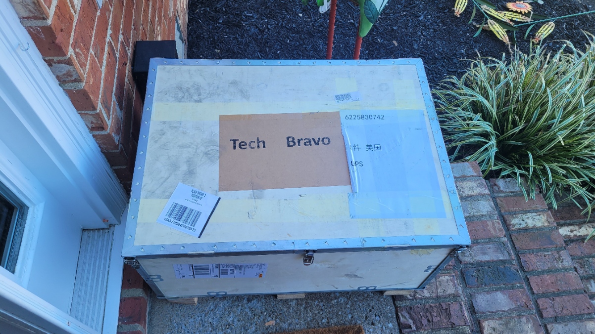 Laser cleaner shipping crate labeled Tech Bravo at delivery